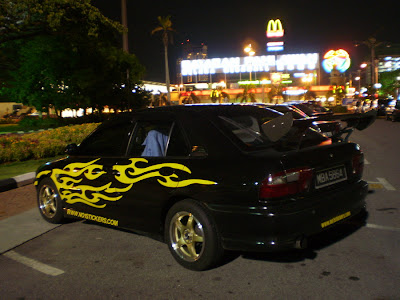 Wira A/B with car body sticker and GT spoiler