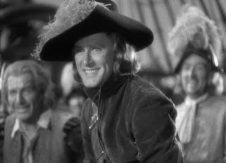 Still from Captain Blood depicting a close-up of Errol Flynn as Captain Blood.