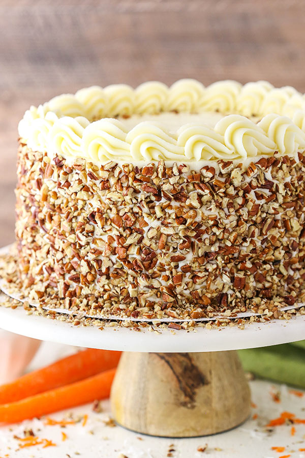 Best Carrot Cake - This Carrot Cake recipe is moist, tender & easy to make! It's seriously the best carrot cake recipe covered in cream cheese frosting for a perfect cake.