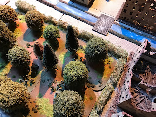 Canadian riflemen and the bomber sections get ready to assault the German positions