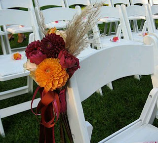 Wedding Chairs Decorated with ribbons and flowers