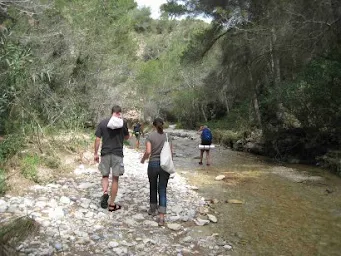 hikers in a river