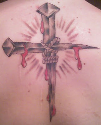 November 23rd, 2010 Nims Posted in Cross Tattoos, nails tattoo