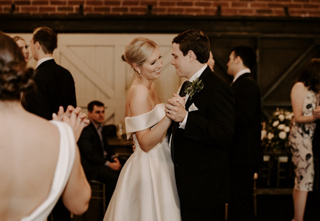 bride and groom dancing