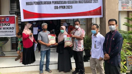 Pemko Payakumbuh Bersama Bulog dan PT. POS Salurkan Bantuan Beras-PPKM