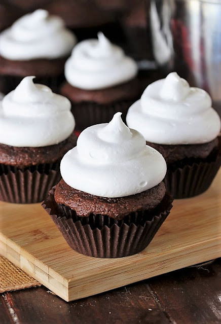 7-Minute Marshmallow Frosting Piped on Chocolate Cupcakes Image