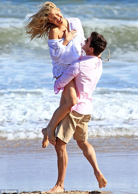Swept off her feet The actress Kate Hudson and Colin Egglesfield hams it