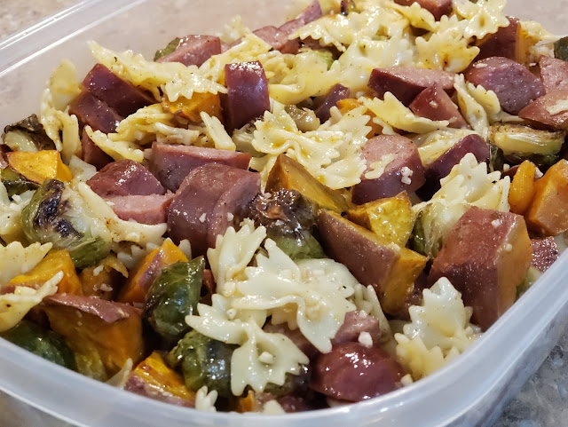 Sausage, pasta and roasted veggies in a to-go container