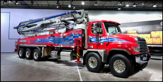 The Freightliner 114SD with a concrete pumper body on display at the IAA