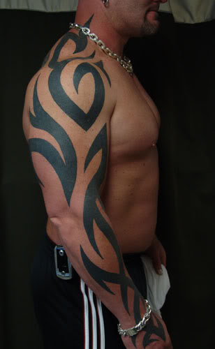 Tribal Arm And Shoulder Tattoo