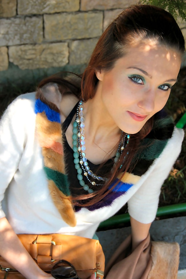 white cardigan with colorful faux fur collar