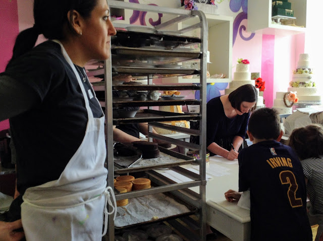 Cake decorating for Mother's Day at Wild Flour Bakery