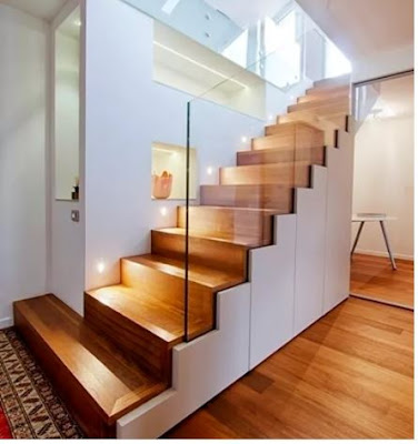 wooden staircase design with glass handrails