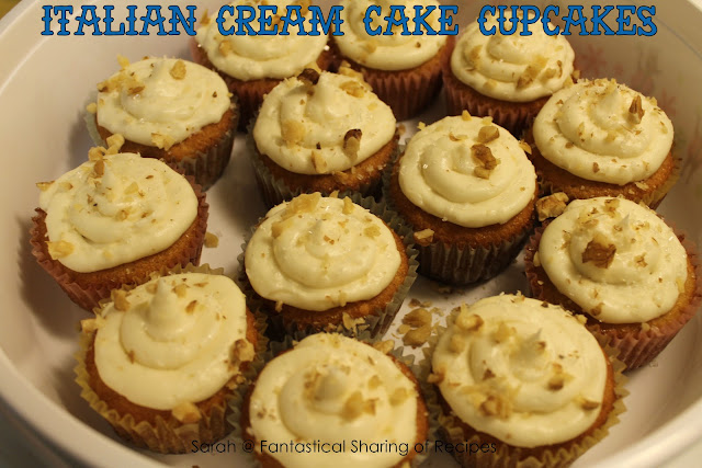 Italian Creme Cake Cupcakes - a sweet vanilla-y cupcake topped with a delicious cream cheese frosting and walnuts. #cupcakes #cake #dessert