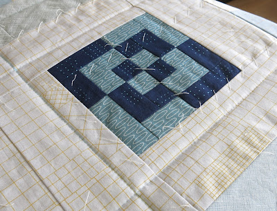 Hand quilting in progress on my modern sampler quilt