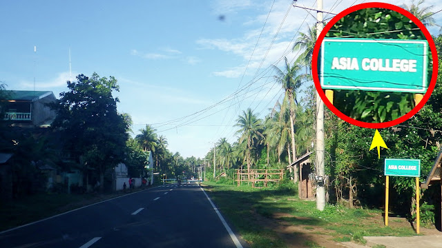 DPWH signboards announcing the approach to Asia College in Bobon Northern Samar