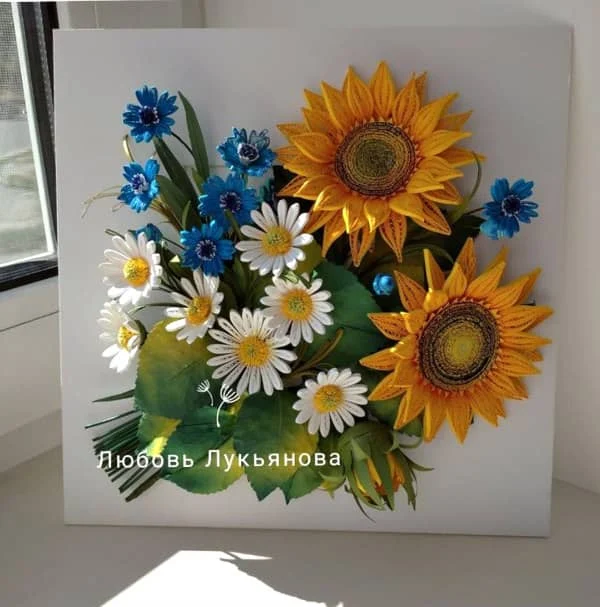 quilled sunflowers card on desk near window