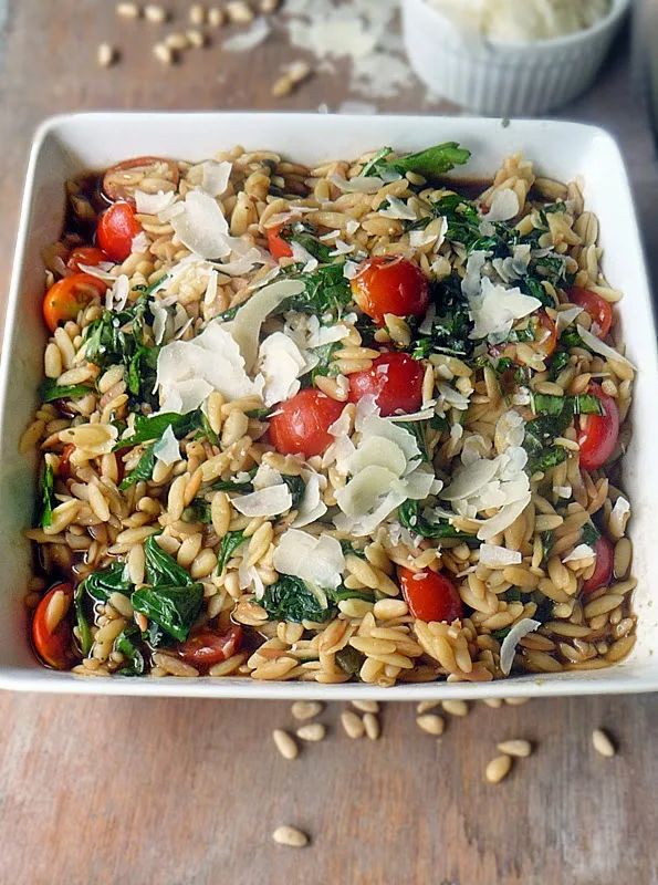 Orzo with Spinach and Tomatoes | by Life Tastes Good is a delicious pasta salad you can serve hot or cold. I love this dish because it tastes so good, but it's also very versatile! #PastaSalad #Italian