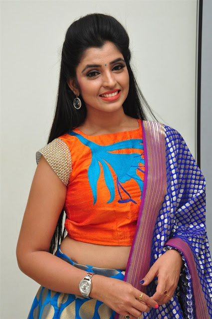 Anchor Shyamala latest pics in orange gagra