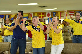 President Juan Manuel Santos and company celebrate Colombia's victory over Uruguay