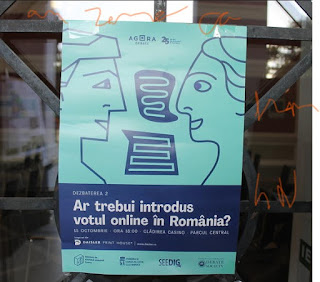 photo of poster on the electronic or online vote debate on a glass display or vitrina