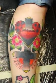 flower heart tattoos