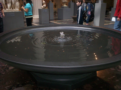 Claudia and Jamie take a bath in the fountain of the Metropolitan Museum of Art and borrow the coins for luandry and food in Mrs Basil E Frankweiler