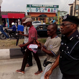 Lagos State commissioner of police spotted with nationwide protesters (Photos) 