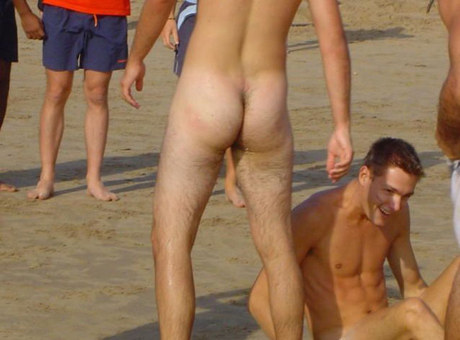 Beach pantsing from two hot naked guys