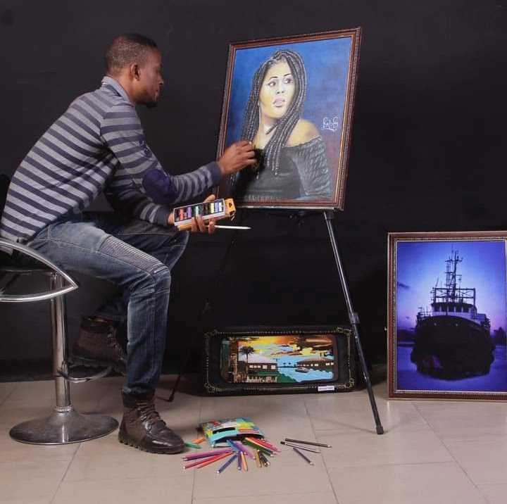An artist painting on a canvas as an hobby