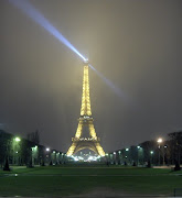 Paris France at Night Photos (the eiffel tower in the rain at night paris france)