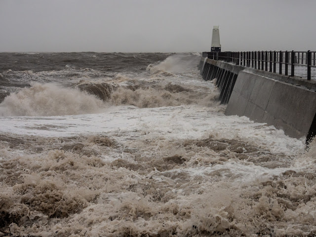 Photo of wild water on the shore at Maryport