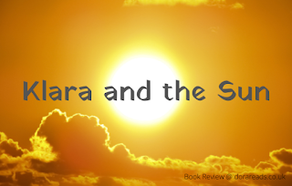 'Klara and the Sun' with an orangey cloudy sky, with the sun at the centre of the image