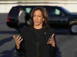 Kamala Harris addressing a crowd during a rally.
