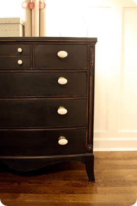 black dresser dark floors