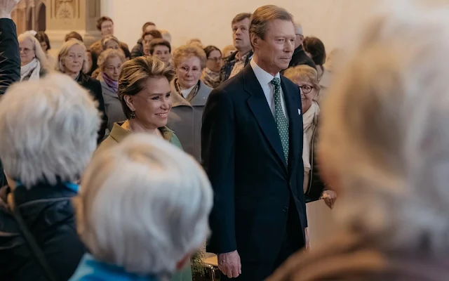 Grand Duchess Maria Teresa wore a green belted wool coat from Belgian fashion house Natan