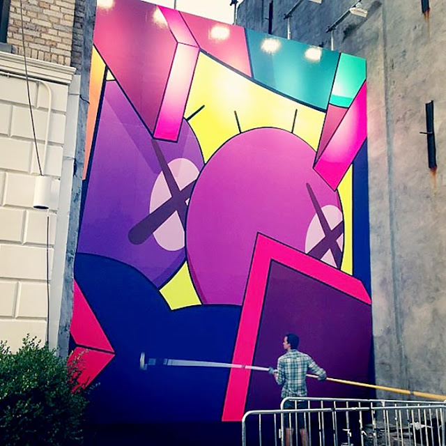 Street Art Mural By KAWS in Brooklyn, New York City. work in progress