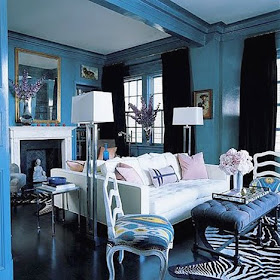 lacquered walls ikat print on chair zebra rug blue green glossy walls blue tufted ottoman