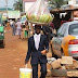 Lols: Man Hawking Watermelon with Suit(sorry i mean COAT)!! PHOTO