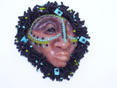 polymer clay face brooch