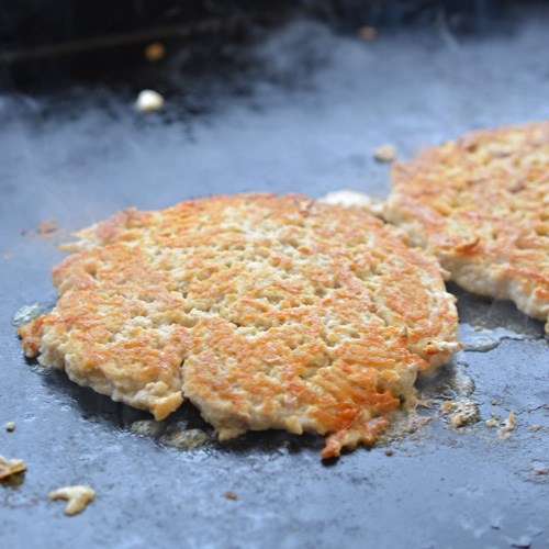 Cooking Buffalo chicken smash burgers on the Blackstone Griddle