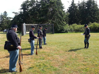 Captain Jones instructs the men.