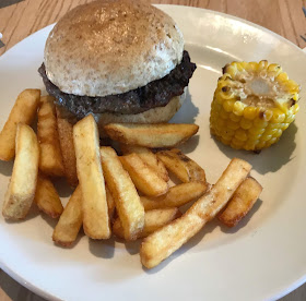 child meal of chips, corn on cob, burger in wholemeal bun 