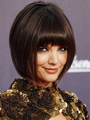 Use the smaller bobby-pins to sweep short hair up completely.