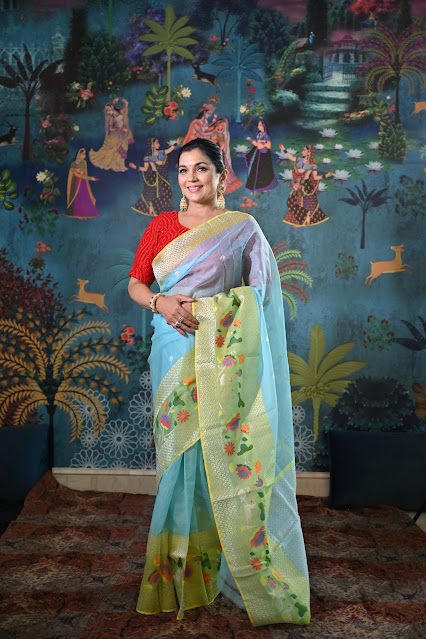 Pure zari kota doria with a skirt border of lotus and swans.