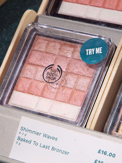 The Body Shop Shimmer Waves Highlighter, in a selection of glow-y pink tones, with white highlight.