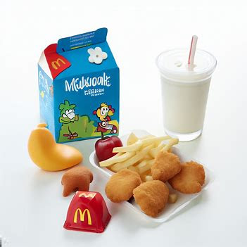 a 4 Piece Chicken McNuggets® Happy Meal with fries, milk, apple slices, and a toy