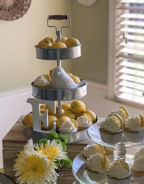 Yellow and White baby girl baby shower decoration ideas. You are my sunshine baby shower theme tips. Food and drinks. Lemon cupcakes. Fruit and yogurt parfait. Baby shower brunch