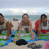 Young girls enjoy vacation tour on jooh beach