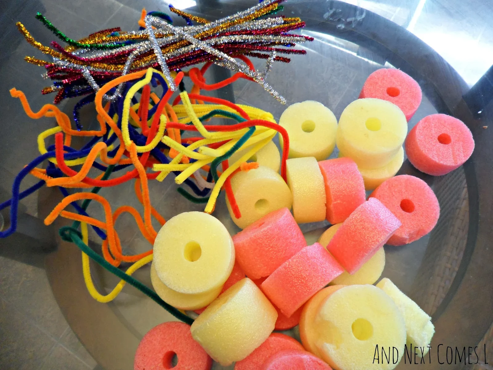 Invitation to build for kids using pool noodles and pipe cleaners from And Next Comes L